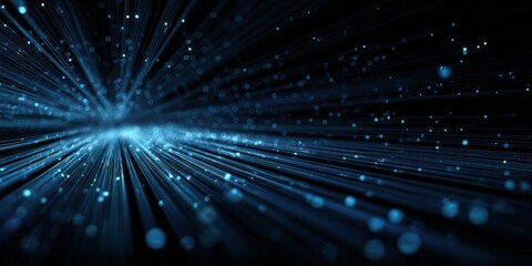 Fototapeta premium Abstract blue light streaks and glowing particles illuminate a dark space.