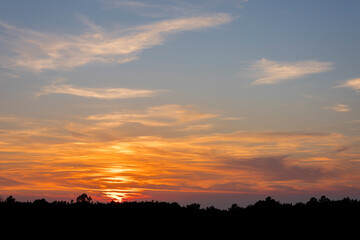 Obraz premium Great views of the sun setting at Praia do Canal in Portugal.