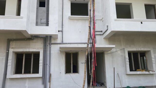 Modern Residential Apartment Building Exterior in Daylight, Newly Constructed White Housing Complex, Urban Real Estate, Architecture, Property Investment, 4K Stock Footage