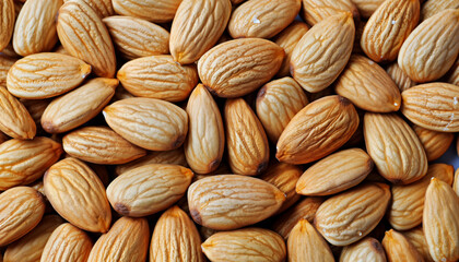 Fototapeta premium Raw Almonds in a Close-Up View on a White Background