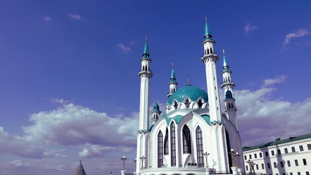 Aerial fly-cam view over the turquoise domes of Kul Sharif Mosque in the Kazan Kremlin, cinematic top-down perspective of the main Jama Masjid and minarets in Tatarstan Russia.