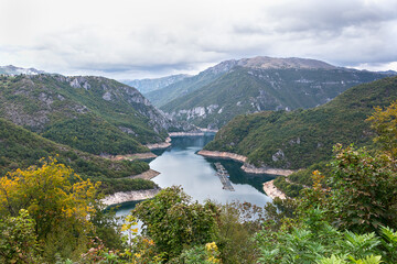 Piv Lake in Montenegro. A picturesque lake in a valley between mountains