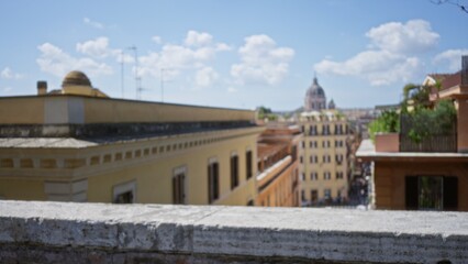 Naklejka premium Rooftop skyline view in soft bokeh with defocused rooftops, terraces and a distant dome, outdoor; background backdrop copyspace calm.