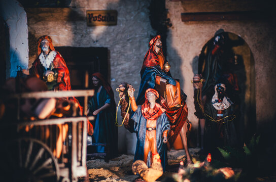 Three Wise Men Journeying to Bethlehem Nativity Scene, Biblical Magi Figures with Camel at the Inn Entrance, Epiphany and Christmas Tradition Concept Background