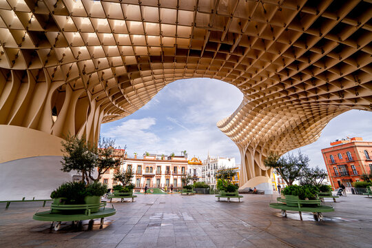 People walking on city square in Spain, Plaza de la Encarnaci&oacute;n, Setas de Sevilla, Seville. One of the most beautiful cities to visit in Europe.