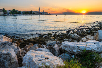 Sunset at the bay of the Adriatic seaand the UNESCO world heritage site Euphrasian Basilica in Porec, Istria, Croatia. © Ondrej Bucek