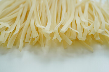 Gluten free fettuccine  on white background 