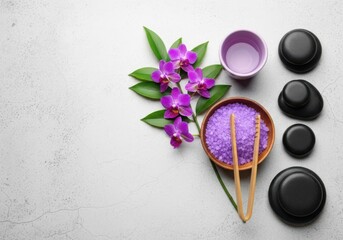 Spa day essentials with purple bath salt and orchid