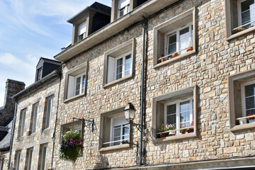 Obraz premium Modern French Stone Townhouses in Bright Sunlight in Normandy
