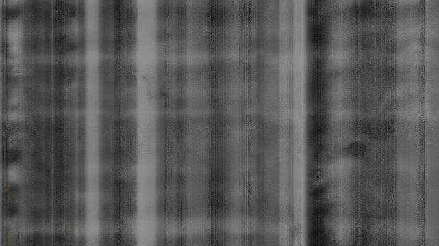 Abstract vertical lines with mottled texture and subtle gradients