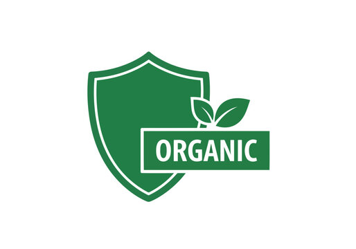 A simple but nice green shield icon with leaves and text organic for natural product certification and quality assurance symbol