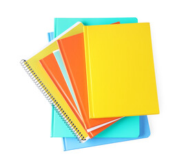 Homework. Stack of colorful notebooks isolated on white, top view