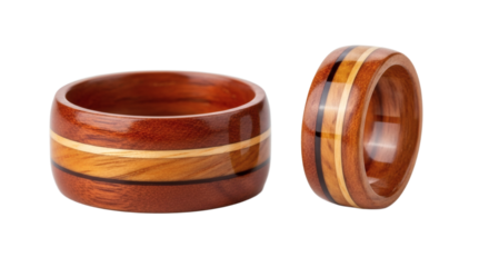 Two wooden rings with inlay stripes, handmade jewelry on transparent background