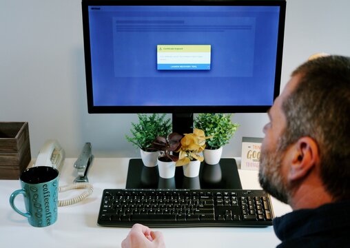 PHALT BLYX Blue Screen ClickFix Style Social Engineering Attack Example as Middle Aged Victim Executes Shell Script Payload Delivery Cyber Concept