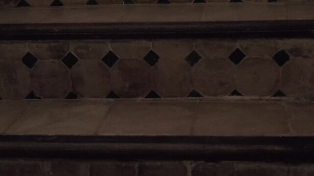 Authentic Moroccan riad interior with checkerboard tiled steps, Traditional riad interior in Morocco, Arabic home decor, vintage decor elements creating authentic experience, exotic travel