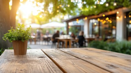 Fototapeta premium Warm afternoon at an empty wood table with a vibrant BBQ backdrop