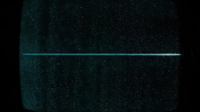 Dark screen with bright horizontal light beam and textured surface