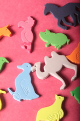 animals toys on a red background