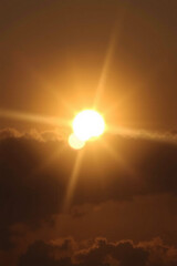 Prismatic Solar Eclipse in Dark Sky