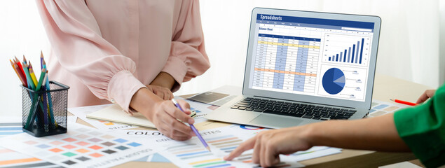 Spreadsheet document information financial startup concept. data and graphs in spreadsheet...