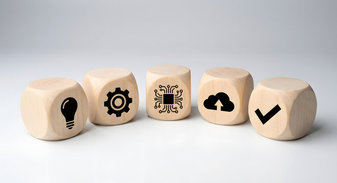 five wooden cubes with technology icons representing idea innovation processing cloud storage and successful implementation for digital transformation and software development