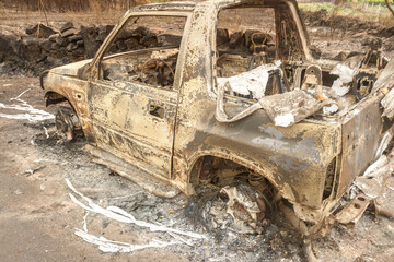 Fototapeta premium Skeleton of car seats after a vehicle fire The Concept of Destruction