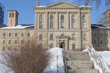 Obraz premium main entrance to The Old Don Jail (1864), restored historic wing, now administrative complex of Hennick Bridgepoint Hospital located at 1 Bridgepoint Dr, seen from Gerrard St E, Toronto