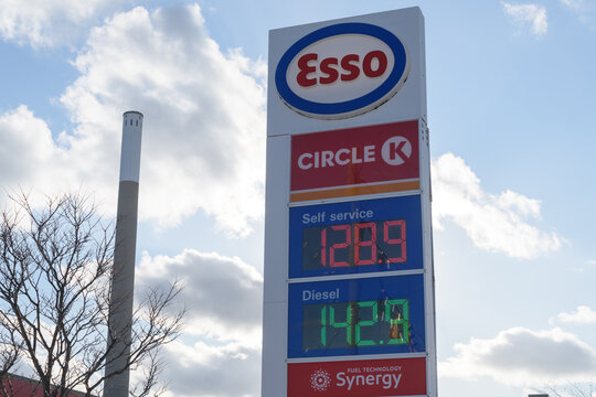 tall roadside display showing the Esso brand name, Circle K, and fuel prices at 829 Lake Shore Blvd E, Toronto
