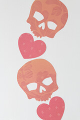 Fototapeta premium orange decor paper skulls with hearts