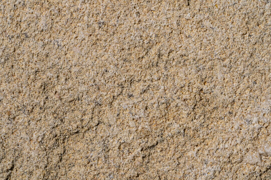 Textured stone surface with intricate patterns