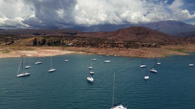 Aerial view of leisure boats anchored in lake Potrerillos in Mendoza, Argentina