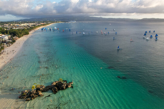 Drone Shot of Boracay Station 1 Coastline with Paraw Boats and Willy's Rock - 5