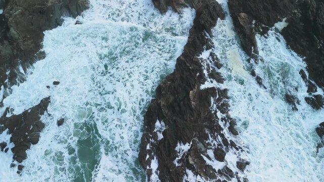 cornwall cliffs seen from drone above watching the water