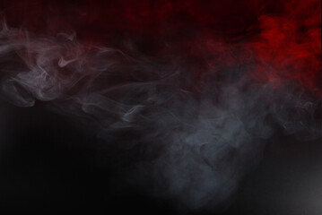 White steam on a black background.