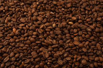 Fototapeta premium Coffee beans on a white background. Coffee beans texture.