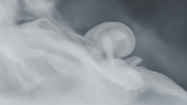 Silky fog with distinct edge diffraction against a soft, dark background Focus on contrast and the optical effect of diffraction.