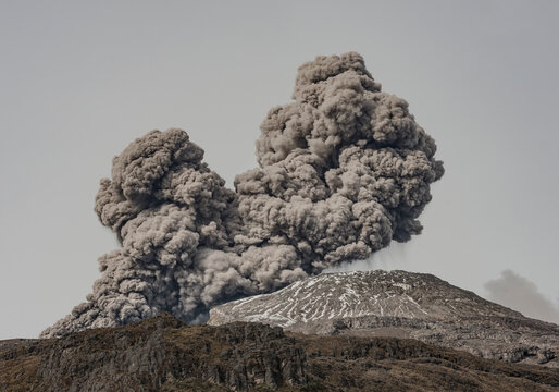 Active volcano erupting massive ash cloud gray sky nevado del ruiz colombia