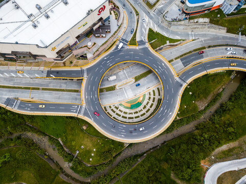 Aerial roundabout city traffic infrastructure highway top view colombia manizales