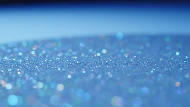 Abstract Fine Glitter Spread Overhead, gently drifting or settling fine glitter particles on a clean surface.