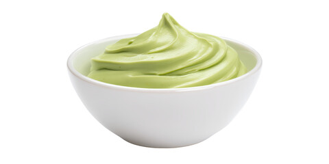 A Creamy Swirl of Light Green Food Like Avocado Puree or Wasabi Dip Is Presented in a White Ceramic Bowl on a Transparent Background.