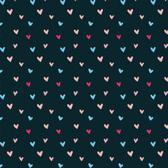 Cute thiny colorful hearts on dark background