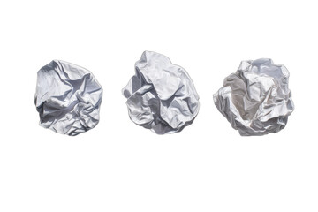 Three crumpled white paper balls on a black background