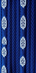 Geometric knit pattern in rich navy blue, cozy feel, knit,  warm