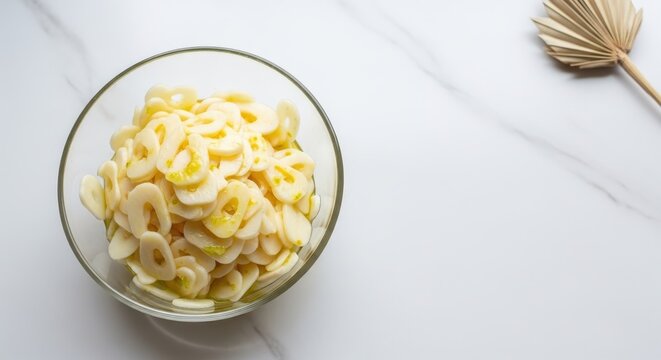 Minimalist Heart of Palm Salad on White Marble with Large Right-Aligned Copy Space