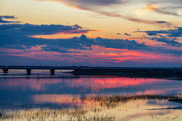Obraz premium The sunset view at Lianhuan Lake in Duerbute Mongolian Autonomous County, Daqing City, Heilongjiang Province, China