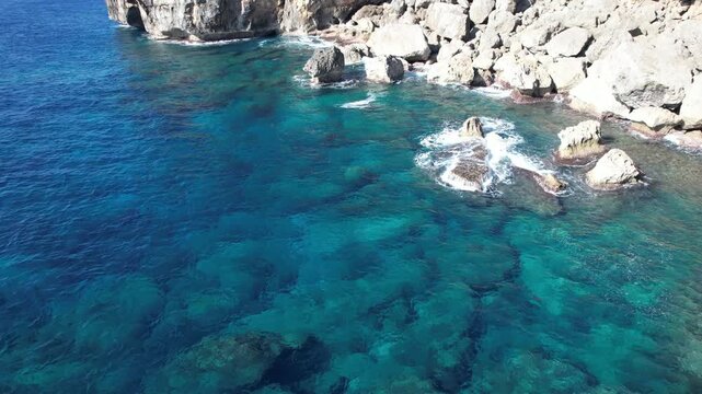 Natural Pattern of Rocks and Clear Sea Along the Coast from Above in Miyako Island, Okinawa, Japan