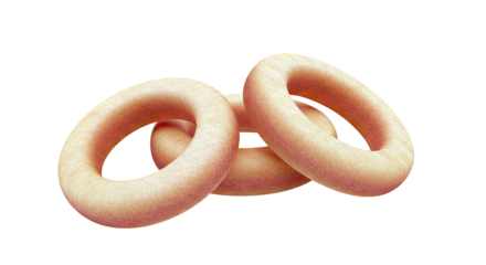 Three golden bagel rings on a white background