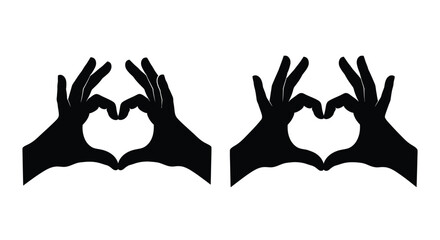 Fototapeta premium Two hands forming heart shapes a striking black and white silhouette
