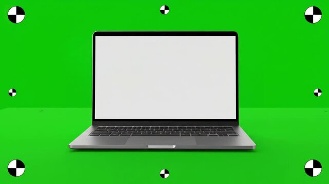 Green Screen Technology with the laptop smoothly rotates towards camera revealing its and switching it on video features a luma matte or cut out mask for shadow layer tracking marks distortion