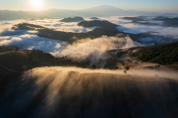 Landscape of Morning Mist with Mountain Layer. mountain ridge and clouds in rural jungle bush forest